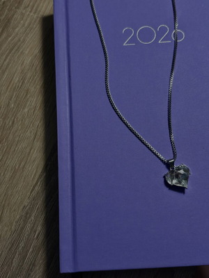 Heart-shaped silver necklace like new, transparent color