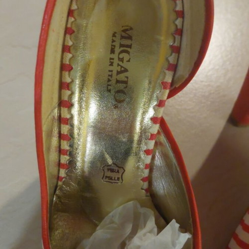Migato red pumps with white stripes size 39 used