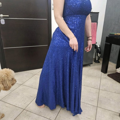 Diamond blue dress like new, open back with shoulder pads