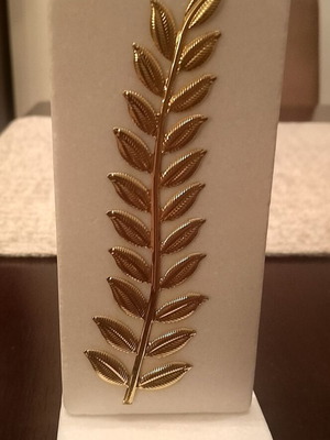 Decorative handmade gold-plated olive branch on Thassos marble new