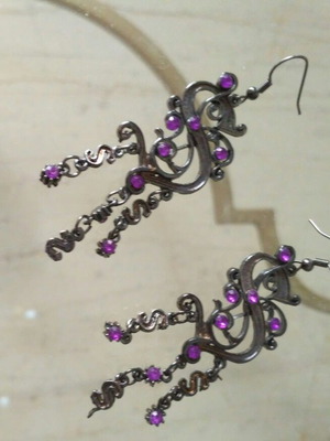 Fo earrings used in silver with purple stones