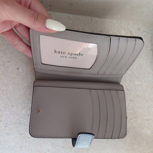 Kate Spade wallet new, turquoise with multiple card slots