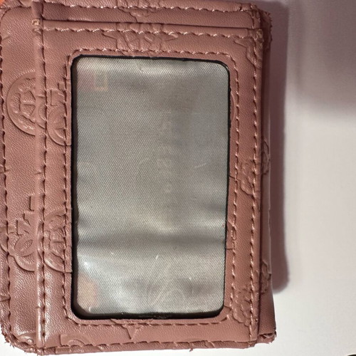 Guess wallet used, small size, pink with many compartments