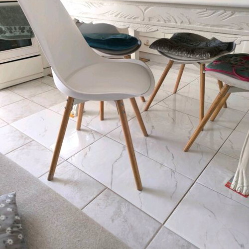 Extendable dining table with four chairs used, leather seats