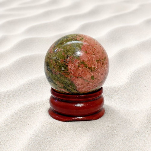 Decorative desk sphere with rosewood base and unakite stone
