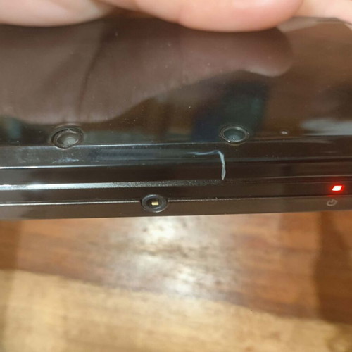 Nintendo 3DS console with charger, memory card and stylus