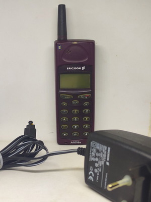 Ericsson A1018s mobile phone like new, plum color, original charger