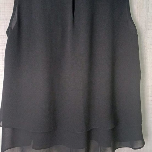 Sleeveless women's blouse black like new with ruffles and sheer detail