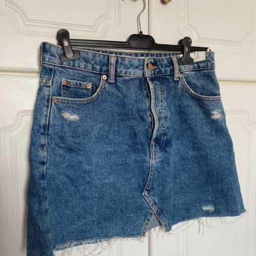 Bershka denim skirt used with rips, size M 38 10, blue