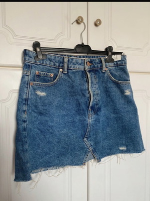 Bershka denim skirt used with rips, size M 38 10, blue