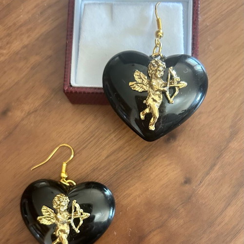 Vintage heart-shaped dangling earrings with embossed angels like new