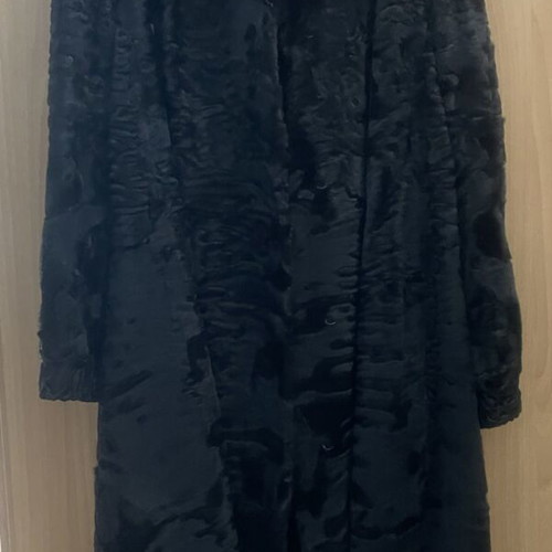Astrakhan fur coat with mink collar