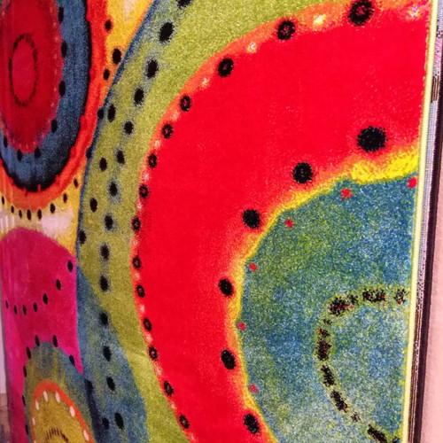 Rug 2x2.90 new with bright colors and geometric shapes