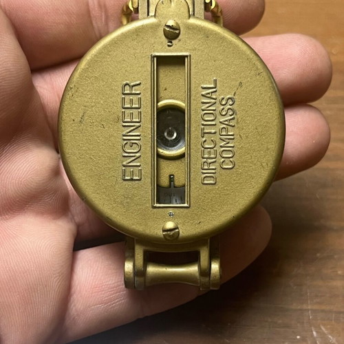 Bronze military-style compass used