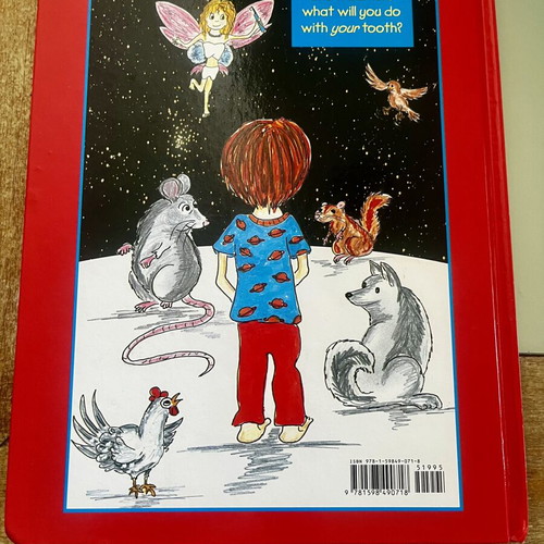 Around the World in 32 Teeth Hardcover book, signed by Olympia Filippeli