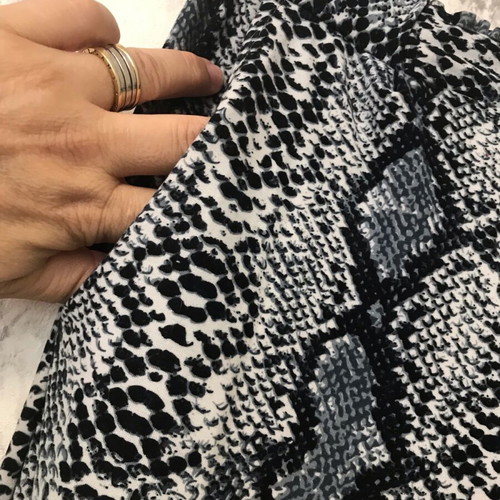 Black and white pants with snake pattern used