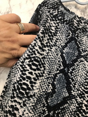 Black and white pants with snake pattern used