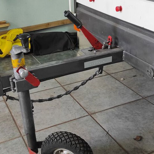 Trailer bag carrier used with removable and folding plywood lid