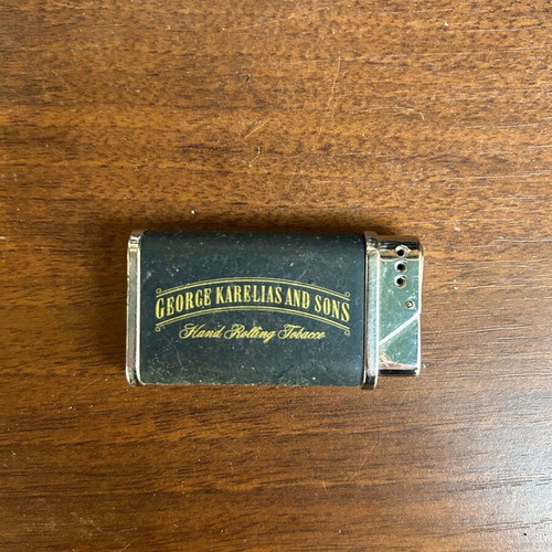 George Karelia And Sons lighter used, in excellent condition