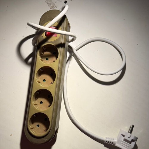 Power strip 4 sockets Schuko with illuminated switch like new, khaki/beige