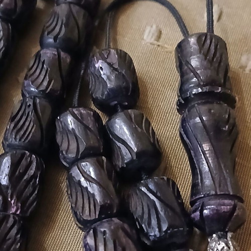 Komboloi bone engraved worry beads used with metal elements and tassel