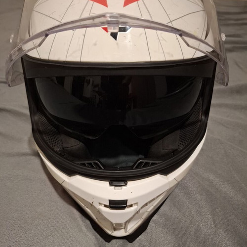 Motorcycle helmet with visor, used