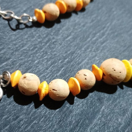 Alternative necklace made of cork with orange beads used