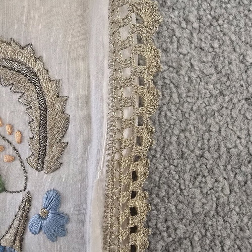 Vintage embroidered pillowcase used with golden details