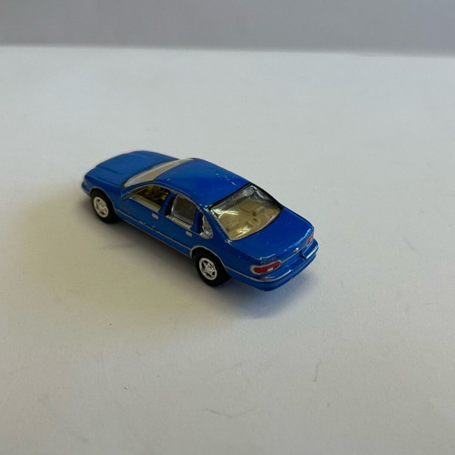 Johnny Lightning 1999 Chevy Caprice 1995 toy car used, very good condition