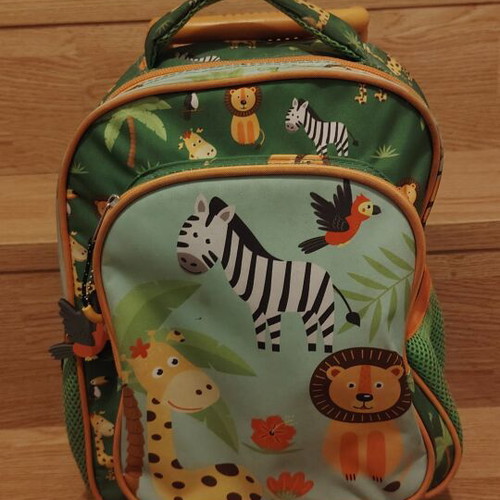 Toddler bag with jungle animals like new, wheels and foldable handle