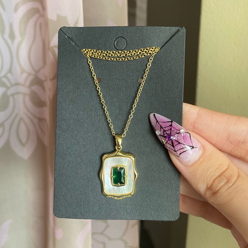 Necklace new steel with green stone