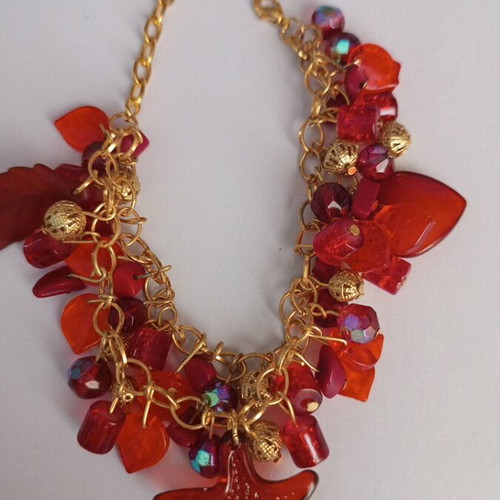 Summer bracelet with red charms, gold, handmade
