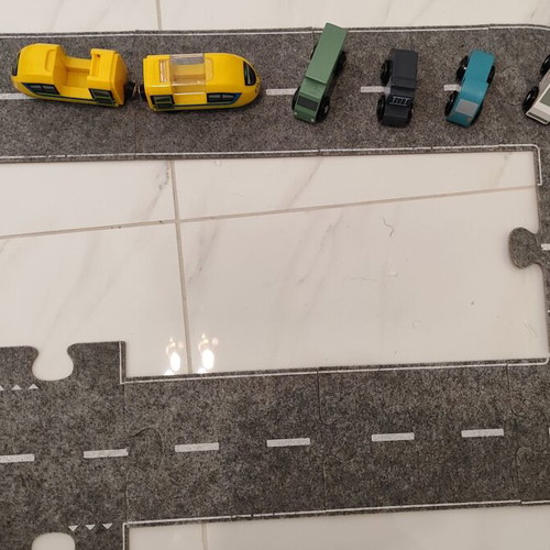 Racetrack with wooden vehicle figures like new