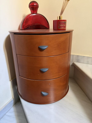 Nightstand set with 3 drawers used and red decorative vase