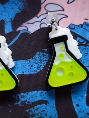 Acrylic earrings with potion bottle design like new