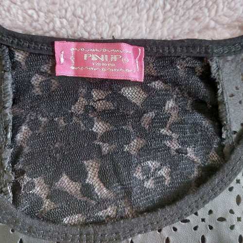 Sleeveless black top with leatherette and lace like new