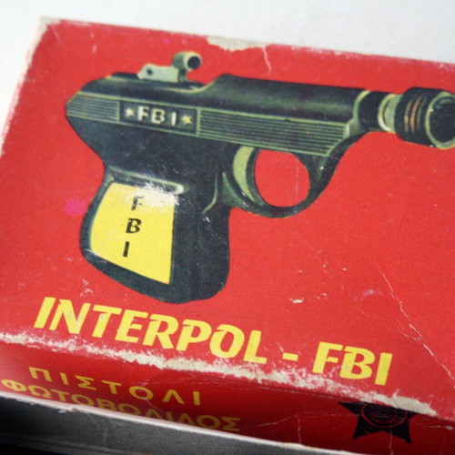 Interpol FBI Biopad toy pistol new, Greek antique
