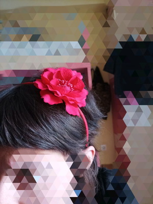 Tiara headband with red fabric flower used