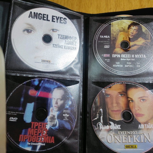 DVD set of 56 with foreign movies like new, in case with sleeves