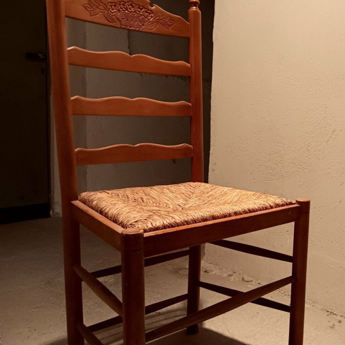 Wooden chair used with cane seat and embossed wood