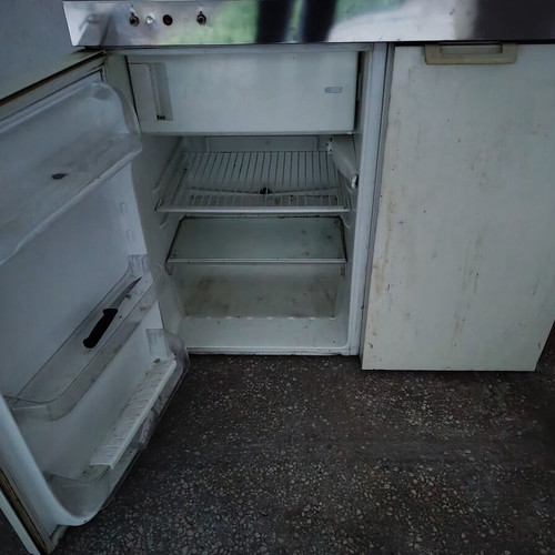 Fridge, kitchen unit and sink used, needs external paint