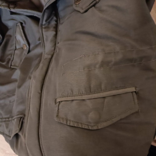 Men's jacket used, size large, with small defect