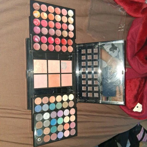 Makeup palette used with 36 lip colors, 6 blushes, 36 eyeshadows and mirror