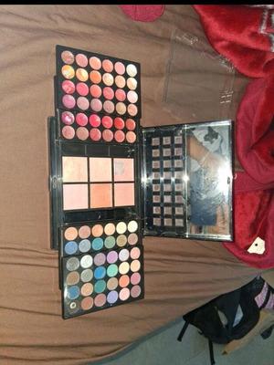 Makeup palette used with 36 lip colors, 6 blushes, 36 eyeshadows and mirror