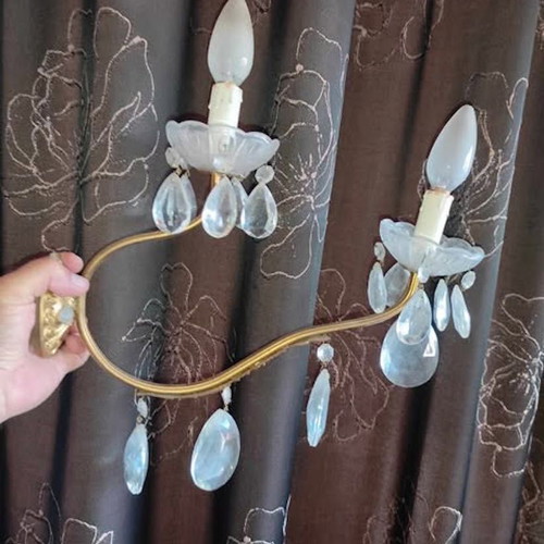Vintage brass two-light wall sconces used with crystals