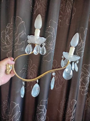 Vintage brass two-light wall sconces used with crystals