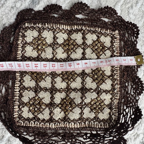 Vintage coasters used with lace and decorative beads in brown-bronze
