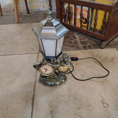 Plastic vintage table lamp with clock used