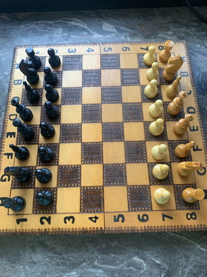 Vintage wooden chess set with pyrography, full classic retro pieces