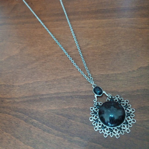 Pendant with glass cabochon in dark brown color, like new